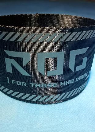Оригінальний текстильний ремінець-стяжка asus rog (republic of gamers) для пк ,для оргменеджменту кабелів
декоративний браслет/стяжка.