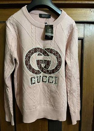 Новий рожевий светр з написом gucci