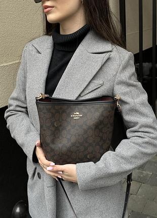 Сумка coach city bucket bag in signature canvas brown black