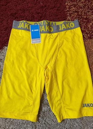 Нові спортивні компресійні шорти / тайтси jako (жовті з бірками, розмір l)