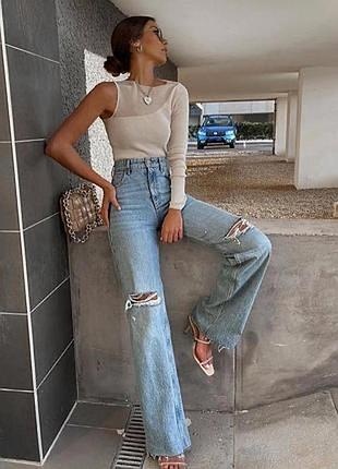 Zara джинси з декоративними потертостями та розривами на колінах