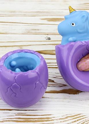 Игрушка антистресс фуфлик единорог голубой из фиолетового яйца
