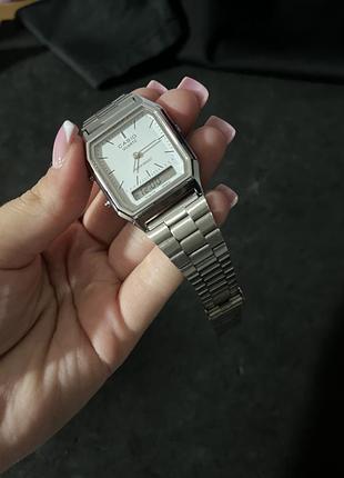 Casio aq-230 — серебристые наручные часы, белые циферблат, классический ретро-дизайн