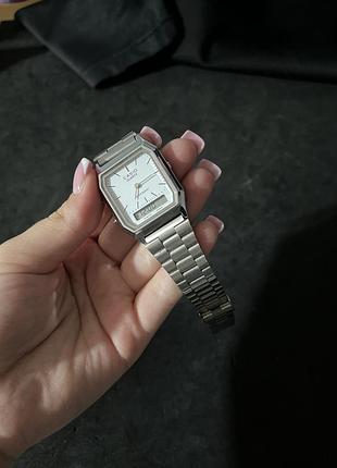 Casio aq-230 — серебристые наручные часы, белые циферблат, классический ретро-дизайн 3