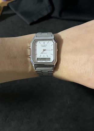 Casio aq-230 — серебристые наручные часы, белые циферблат, классический ретро-дизайн 4