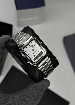 Часы наручные casio aq-230 серебристые с белым циферблатом