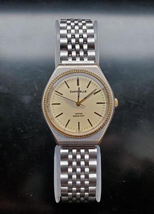 Годинники чоловічі caravelle by bulova механічні, сріблясті із золотистим циферблатом