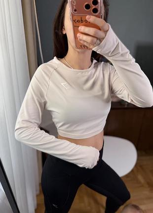 Молочна біла спортивна вкорочена кофта gymshark