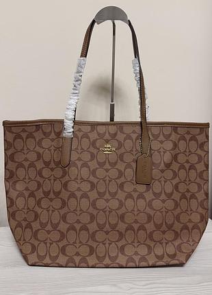 Шопер для жінок coach new york коричневий з монограмою