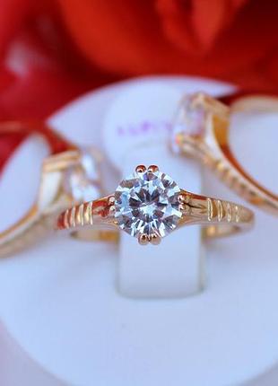 Кольцо xuping jewelry лесенка по бокам с камнем 7 мм р 18 золотистое