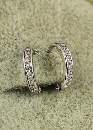 Серьги xuping jewelry кольца с камешками 1,1 см серебристые