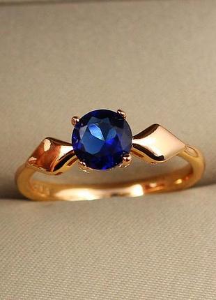 Кольцо xuping jewelry с синим камнем и ромбами по бокам р 16 золотистое