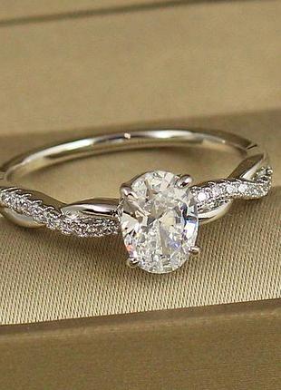Кільце xuping jewelry косичка з овальним каменем р 19 сріблясте