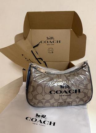 Сумка жіноча coach багет бежева з монограмою