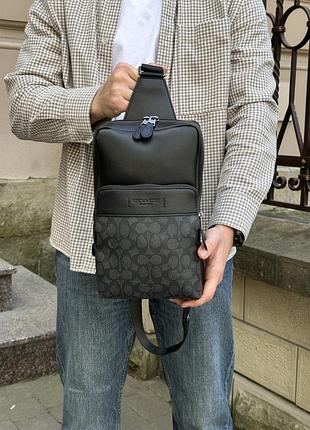 Мужская кожаная сумка coach gotham с фирменной канвой чёрная с серым 18 х 31 х 8 см
