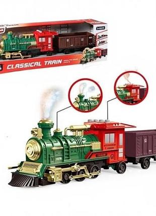 Игрушка поезд retro train с подсветкой, звуками транспорта и спецэффектами 2181 43*10*10см зелёный с красным