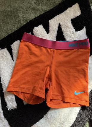 Шорти жіночі nike pro помаранчеві