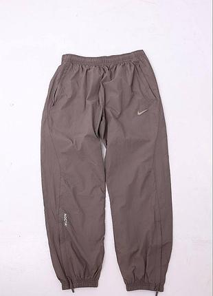 Нейлоновые брюки nike nocta