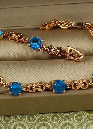 Браслет xuping jewelry фуете з блакитними каменями 17 см 6 мм золотистий