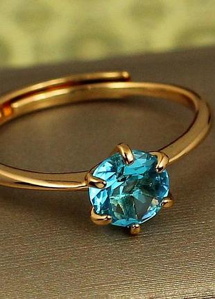 Кольцо xuping jewelry тонкое раздвижное с голубым фианитом р 17 золотистое