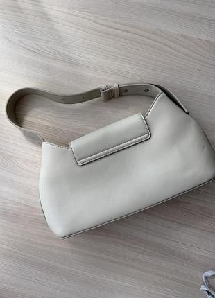 Сумка для жінок calvin klein бежева 2