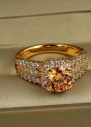 Кільце xuping jewelry магічний елексир із жовтим каменем р 16 золотисте