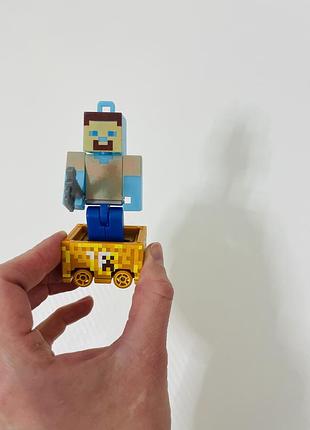 Іграшкова фігурка для хлопчика minecraft стів у вагонетці