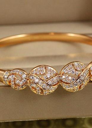 Браслет бенгл xuping jewelry сяючі орбіти на руку від 16 см до 18 см золотистий