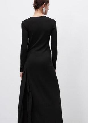 Довга жіноча сукня zara чорна трикотажна з асиметричною складкою
