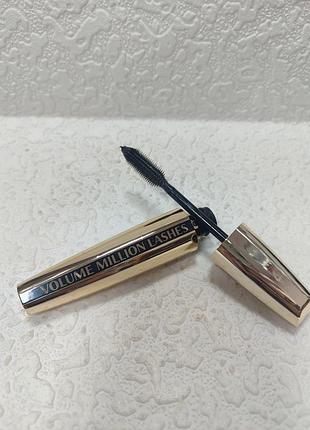 Классическая объемная тушь для ресниц l’oréal paris volume million lashes в золотистом флаконе.