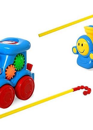 Каталка 0373 "потяг" з ручкою, 2 кольори, в кульку р.20*10*13 см yg toys