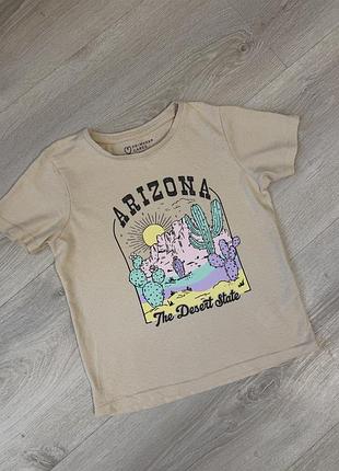 Футболка для дівчинки primark бежева з принтом arizona 122-128 см, розмір вказано 8-9років, краще на 7-8років