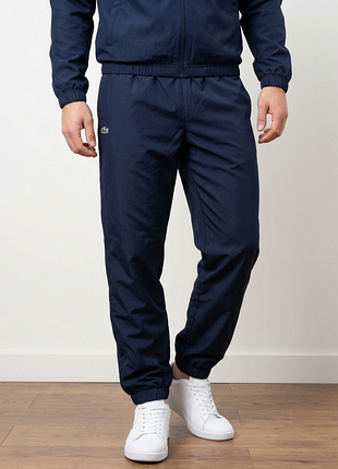 Оригинальные нейлоновые lacoste
спортивные штаны
relaxed fit