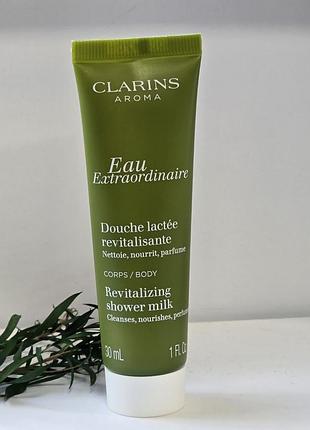 Оригінал відновлюючи ревіталізуюче молочко для душа clarins eau extraordinaire shower milk