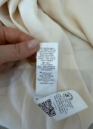 Коротка спідниця молочного кольору 8