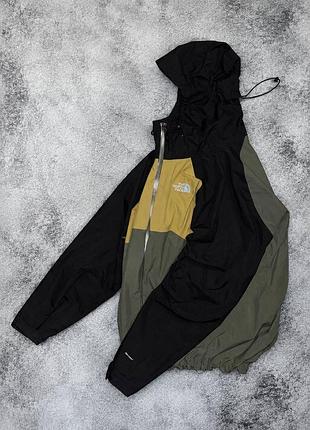 Вітровка чоловіча the north face stratos чорна, хакі, гірчична, розмір l