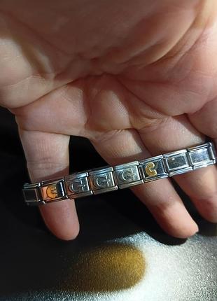 Nomination браслет, буквы позолота c, c - маркировка, остальные 18 звеньев просто stainless steel, винтаж