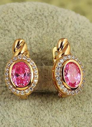 Сережки xuping jewelry магічний овал з рожевим каменем 1.7 см золотисті
