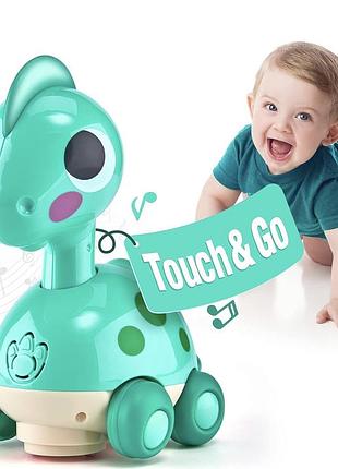 Интерактивная музыкальная игрушка-динозавр hahaland dino baby 12m+ - ходит, светится, издает звуки