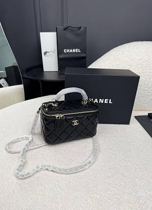 Жіноча сумка mini vanity case in black lambskin 7