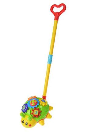Каталка a0392 "жук" з ручкою, 2 кольори, в кульку р.20x12x23 см yg toys