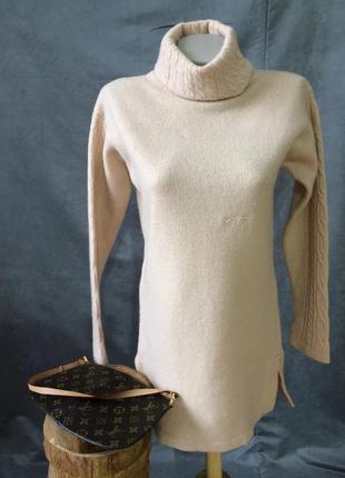 Шерстяной свитер туника. цвет нежно - бежевый.5 фото