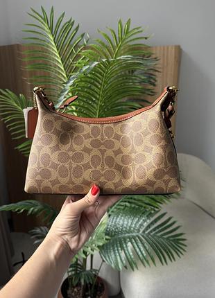 Сумки для жінок coach juliet bag in signature canvas бежевий/золотистий