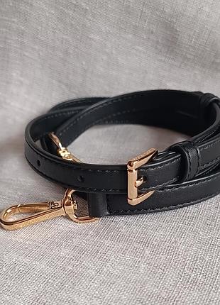 Черный ремень для сумки от michael kors.