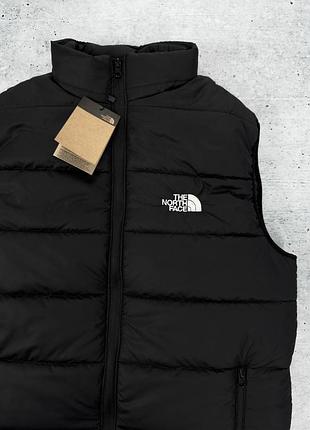 Жилет tnf черного цвета 6