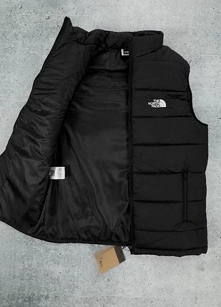 Жилет tnf  чорного кольору