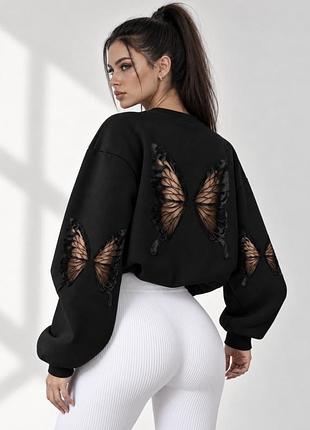 Жіночий чорний світшот oversize з метеликами на спині та рукавах