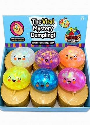 Антистресс сквиш пельмень dumpling с ярким наполнителем 8.5 см в коробочке сюрпризе