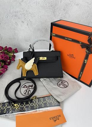 Hermes kelly mini black gold 19x12x6