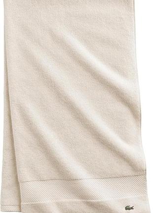 Пляжний рушник lacoste heritage supima з бавовни колір слонова кістка 76x137 см